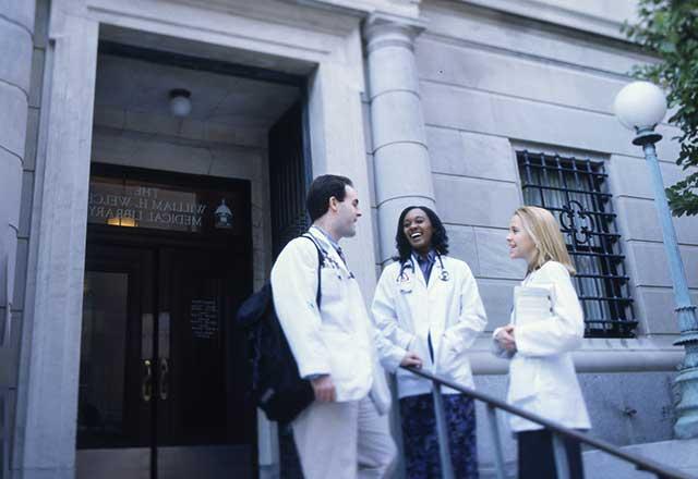 Medical students standing outside the Welch Medical Library