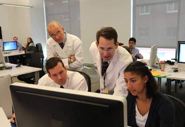 Faculty and students in the computer lab